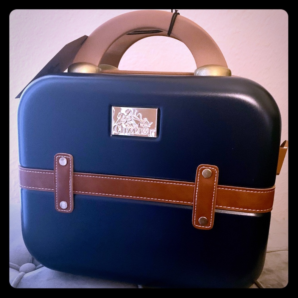 Navy blue and tan travel bag for women